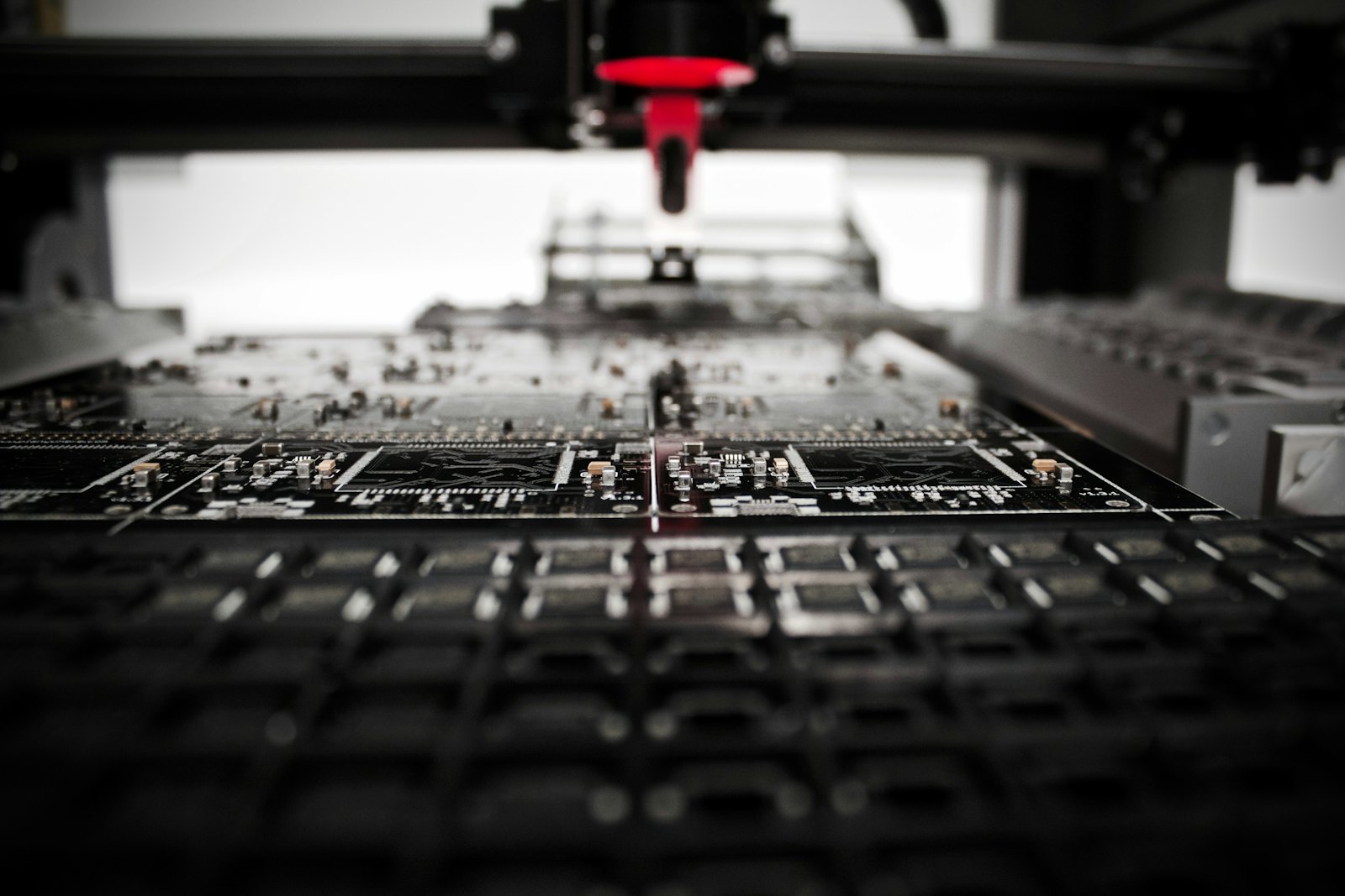 A placement head above a circuit board